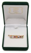 A 14ct gold and enamel Naval pennant brooch:, in the form of a flag pole with the signal 'Dearest',