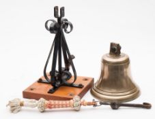 A ship's bell:, reputedly recovered form the German ship 'Stuttgart' in Teignmouth Bay, unnamed,