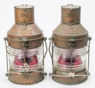 A pair of copper and brass Metorite oil lamps for the signal 'Not Under Command':,