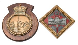 A brass ship's badge for HMS Leander and another for HMS Tyne:,