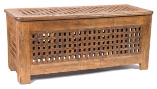 A teak rectangular table constructed from ship's deck grates:, 54 x 141 x 57cm.