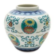 A Chinese doucai 'chrysanthemum' jar: of ovoid form with short inverted rim,