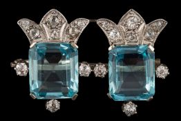 An aquamarine and diamond mounted bar brooch: each rectangular aquamarine approximately 12.