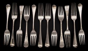 A set of twelve George III silver Old English pattern table forks, maker William Sumner I, London,