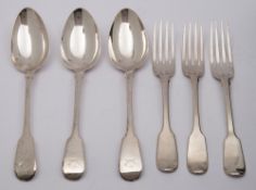 Three George IV silver fiddle pattern table forks, maker William Chawner, London, 1823: crested,