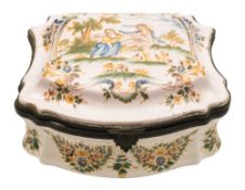 A 'Moustiers' faience casket: of cartouche form,