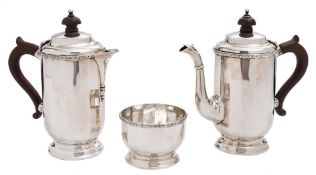 A matched George V silver three-piece tea service, maker William Neale & Son Ltd, Birmingham,