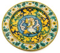 A Cantagalli majolica charger: painted in the 16th century Deruta manner with a head and shoulders