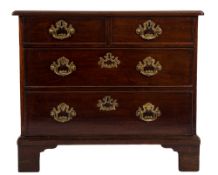 An early George III mahogany rectangular chest:, the top with a moulded edge,
