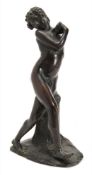After Ernst Seger a bronze study of Bacchus as a boy: the youth leaning against a tree stump