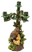 A Hugo Lonitz majolica four-light candelabrum: in the form of a partridge and her two chicks below