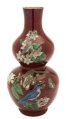 A Chinese 'sang-de-boeuf' double gourd vase and a brown glazed vase: the first later painted with a