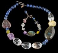 A multi-gem set single-string necklace by Katherine Bree: comprising labradorite and amethyst
