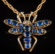 A sapphire mounted insect pendant: set with fourteen graduated oval and cushion-shaped sapphires