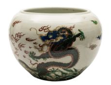 A large Chinese famille verte 'dragon' jardiniere: of globular form,