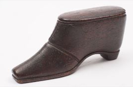 A 19th century novelty snuff box: in the form of a shoe, with sliding top, 9cm. long.