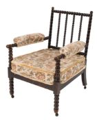 A Victorian ebonised and simulated rosewood bobbin turned armchair:,