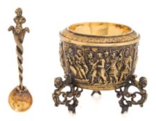 An Augsburg silver gilt salt and spoon: of circular form decorated in low relief with scenes from