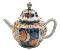 A Chinese Imari teapot and cover: of globular reeded form, painted in iron-red,