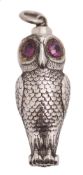A white metal propelling pencil in the form of an owl by S Mordan & Co:, inset amethyst glass eyes,