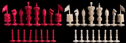 A Chinese ivory Burmese pattern chess set: one side stained red, the other side left natural,