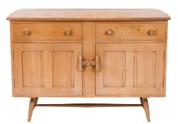 A 1960's Ercol elm and beech dining suite:,