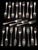 Twenty one Old English pattern table forks, various makers and dates: crested,