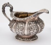 A William IV silver cream jug, maker John Whiting, London,