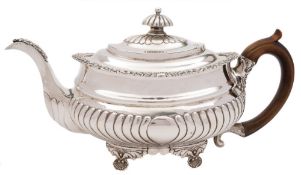 A George III silver teapot, maker's mark worn, London,