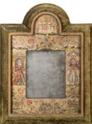 A Charles II embroidered mirror frame: of arched outline,