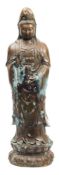 A large bronze figure of Guanyin: dressed in traditional robes and standing on a lotus flower, 75cm.