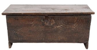 A 17th Century oak rectangular plank coffer:, of small size,