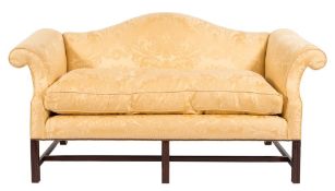 A mahogany frame settee in the Georgian taste:, with a serpentine stuff over back,
