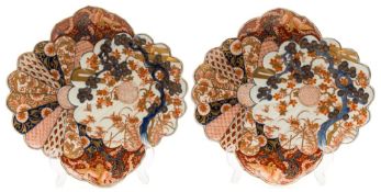 A pair of Japanese Fukagawa fan-shaped dishes: painted in the Imari palette with ho-ho, pine trees,