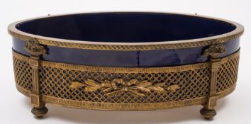 A late 19th century Sevres porcelain and gilt mounted planter: of oval outline,