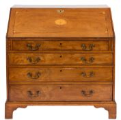 An early 19th Century mahogany and inlaid bureau:, bordered with ebonised and boxwood lines,
