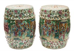 A pair of Canton famille rose porcelain barrel-shaped garden seats: each with reticulated coin