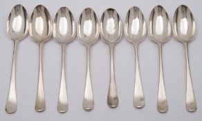 Eight Georgian silver Hanoverian pattern dessert spoons, marks worn,
