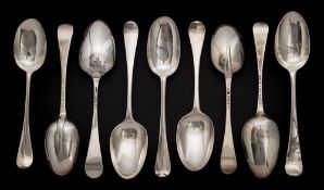 Nine Georgian silver Hanoverian pattern tablespoons, various makers and dates: some initialled,