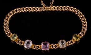 A multi coloured gem-set curb-link bracelet: with graduated cushion shaped gems in cut-down collect