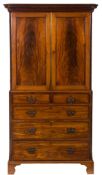 A 19th Century mahogany linen press:,