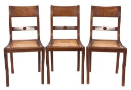 A set of eight Regency Colonial rosewood dining chairs:,