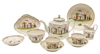 A New Hall porcelain part tea service: painted in the 'mandarin' palette with Oriental figures in a