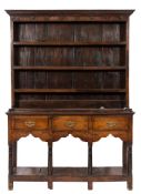 An 18th Century oak dresser:, of comparatively small size,