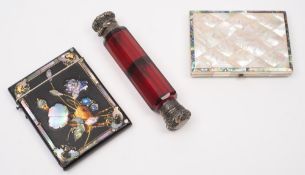 A Victorian mother-of-pearl card case: of rectangular outline, with velvet lined interior, 11cm.