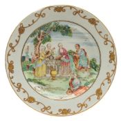 A Chinese famille rose Biblical subject plate: painted with 'Rebecca at the Well' pouring water