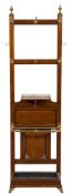 By Jas Shoolbred A late Victorian mahogany and brass mounted hall stand:,