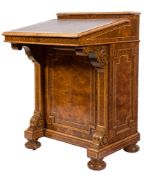 By J & T Scott - A Victorian amboyna wood and ivory line inlaid Davenport:,