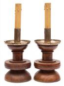 An unusual pair of late Victorian silver mounted walnut electrolier candlesticks,