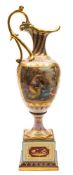 A Vienna porcelain pedestal ewer: set on a square base with slender raised neck and scroll handle